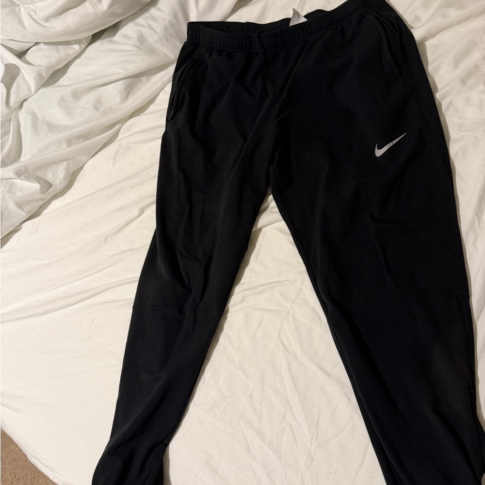 Nike Black Track Pants (cloth) with White Swoosh size L
